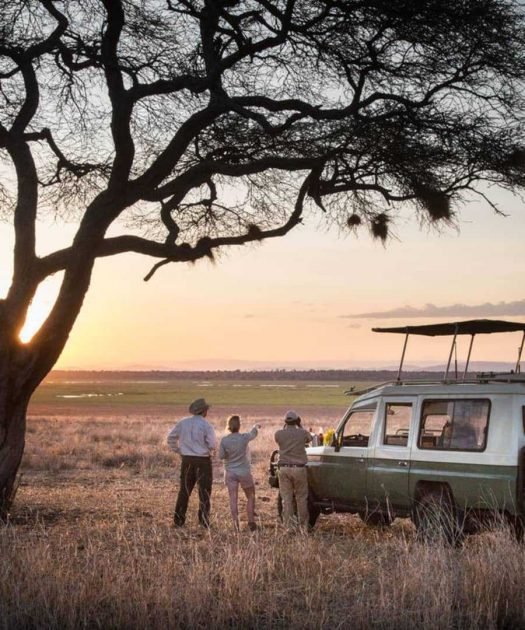 African safari luxury lodge at sunset curated by Chaya Voyages